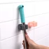 Öntapadós fali seprű / mop tartó RC-K-1152, szürke